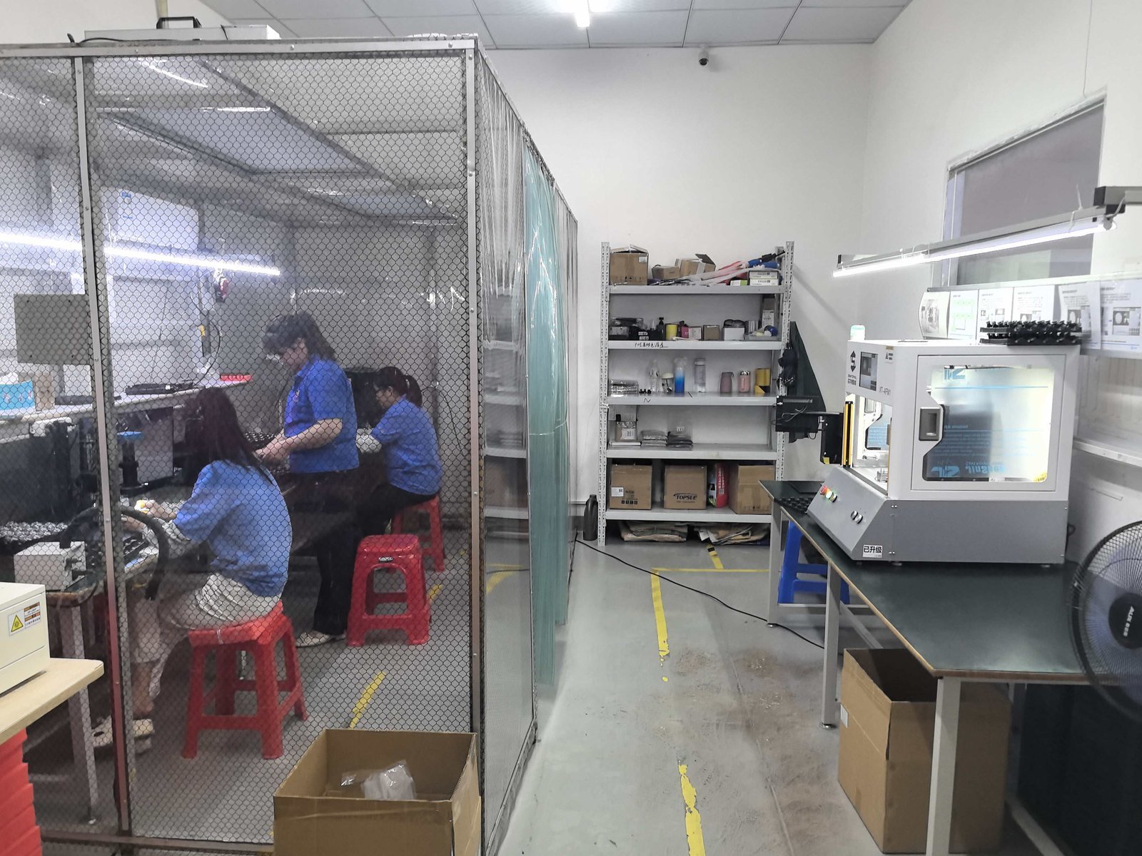 ENSTER quality control area with CCTV camera testing equipment